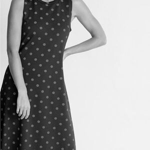 Elegant Blue Midi Dress with Floral Print and Flowy Skirt